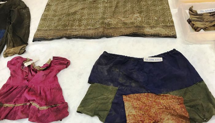 Conservation and restoration of textiles belonging to inmates of S-21 prison, Tuol Sleng Genocide Museum, Phnom Penh, Cambodia. Photo: Hannah Baade